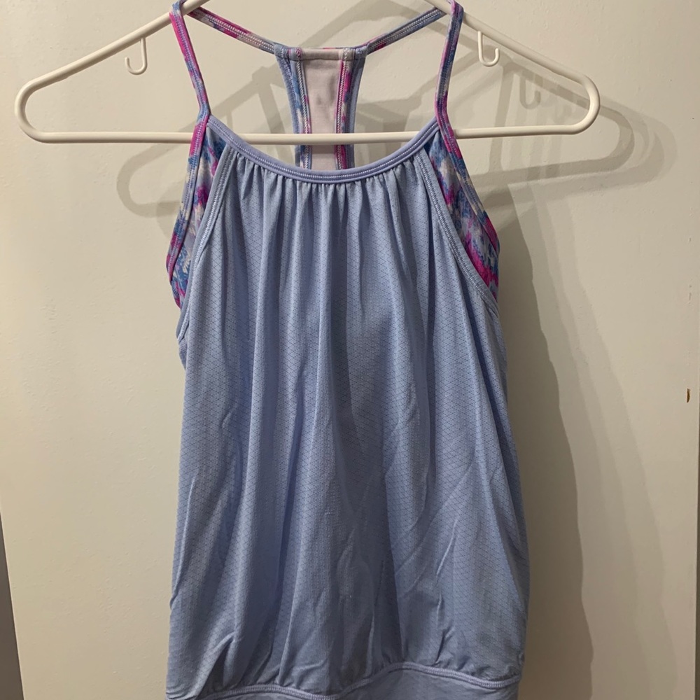 purple and pink ivivva tank top